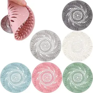 Runde Abflusssiebe mit Spiralmuster in Rosa, Grau, Weiß, Blau, Grün und Dunkelgrau